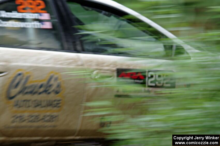 Matt Coatsworth / Ben Anderson Dodge SRT-4 at speed on SS9, Sawmill Lake.