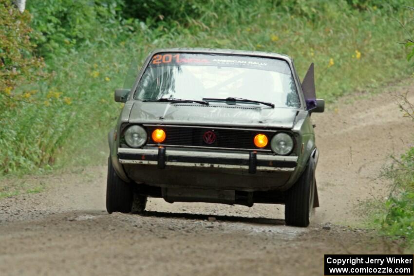 Adam VanDamme / Jake Carlson VW Rabbit at speed on SS9, Sawmill Lake.