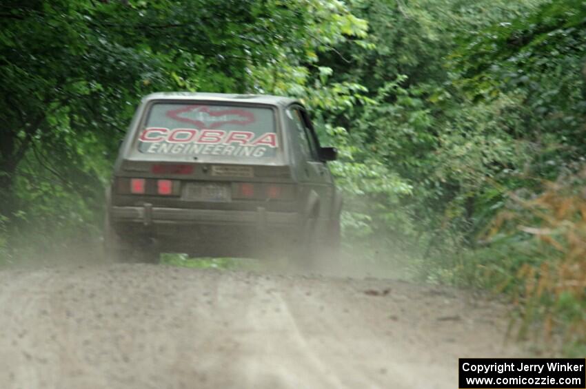 Adam VanDamme / Jake Carlson VW Rabbit at speed on SS9, Sawmill Lake.