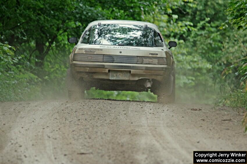 Mike Halley / Jimmy Brandt Mazda RX7 GSL-SE at speed on SS9, Sawmill Lake.