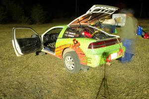 Eric Carlson / Camille Carlson Mitsubishi Eclipse is refueled before leaving Sidnaw service.