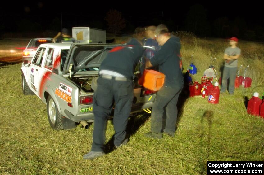 Jim Scray / Colin Vickman Datsun 510 is refueled before leaving Sidnaw service.