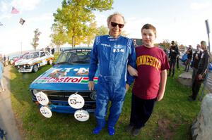 Hannu Mikkola poses with a young fan.