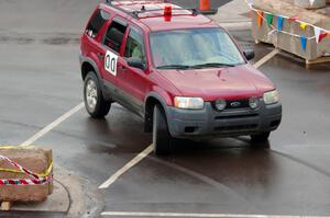 Car 00, a Ford Escape, clears the course.