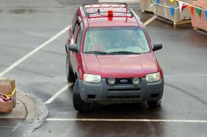 Car 00, a Ford Escape, clears the course.