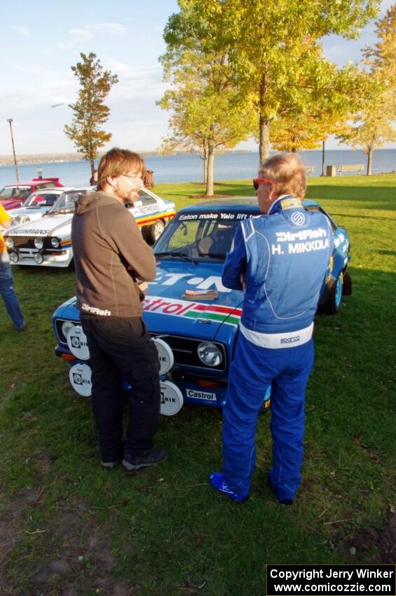Hannu Mikkola chats with a fan at parc expose in L'Anse.