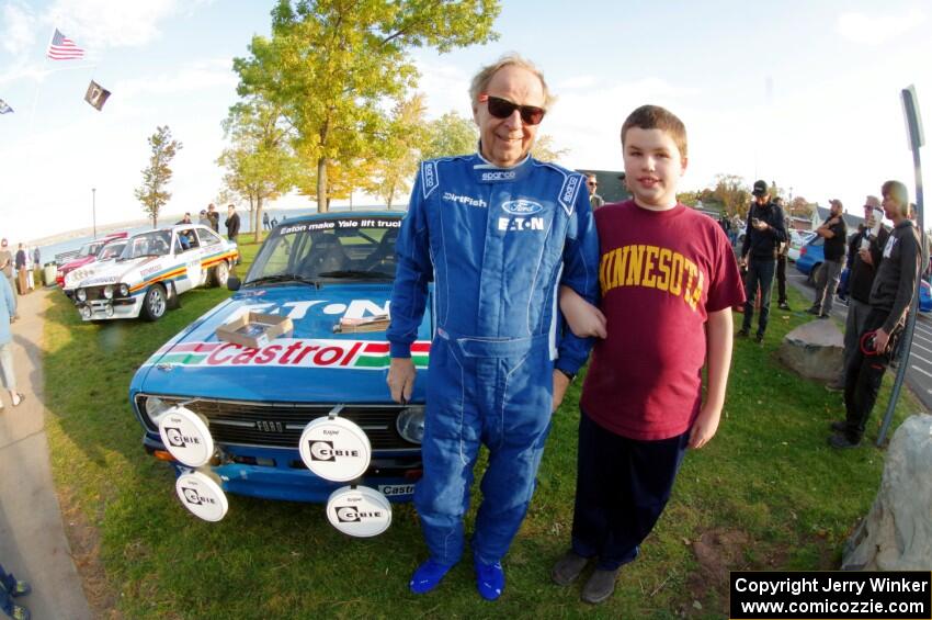 Hannu Mikkola poses with a young fan.