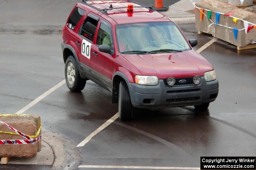 Car 00, a Ford Escape, clears the course.