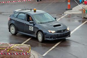 Car 0, a Subaru Impreza, clears the course.