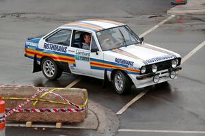 A classic Ford Escort Mk. II does a run of the course.