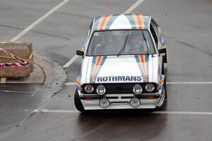 A classic Ford Escort Mk. II does a run of the course.