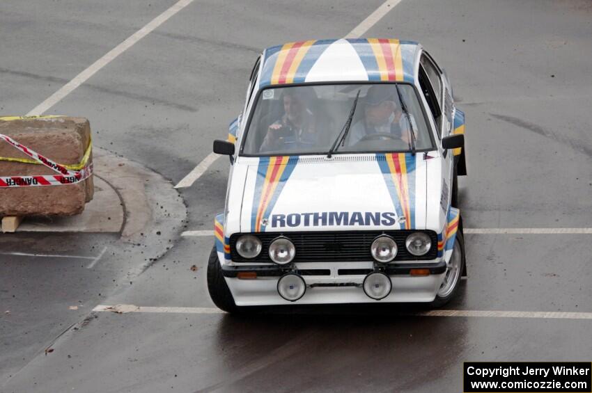 A classic Ford Escort Mk. II does a run of the course.