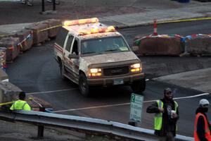 Paul Ahles' GMC Truck working med sweep after SS15 (Lakeshore Drive).