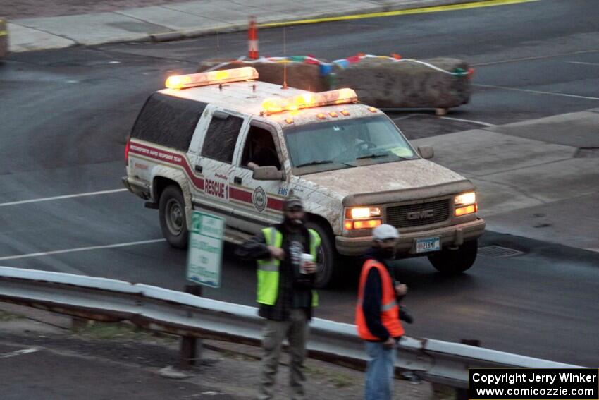 Paul Ahles' GMC Truck working med sweep after SS15 (Lakeshore Drive).