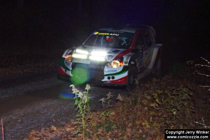 Arkadiusz Gruszka / Lukasz Wronski Mitsubishi Mirage RS comes through the spectator point on SS4 (Far Point I).