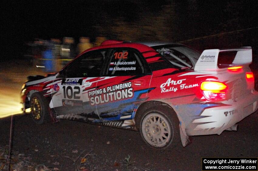 Arek Bialobrzeski / Aris Mantopoulos Subaru Impreza comes through the spectator point on SS4 (Far Point I).