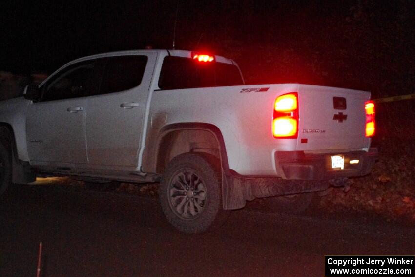 A Chevy Siverado sweep truck clears SS4 (Far Point I).