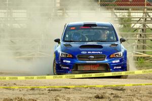 Travis Pastrana / Robbie Durant Subaru WRX STi on SS1.