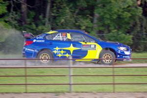 Travis Pastrana / Robbie Durant Subaru WRX STi on SS2.