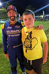 Travis Pastrana and a young fan David Higgins / Craig Drew Subaru WRX STi  at Thursday night's parc expose.