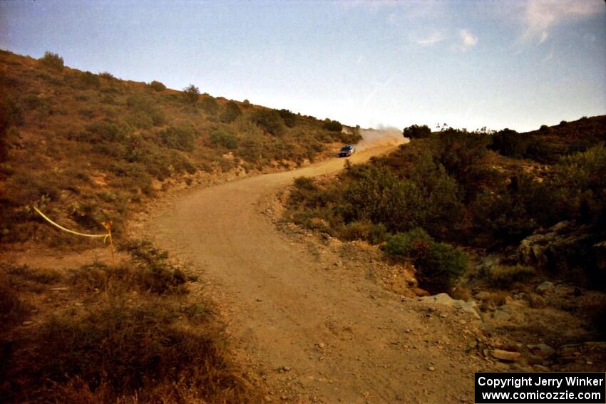 Mark Lovell / Mike Kidd Subaru WRX heads downhill on SS1, Mayer South.