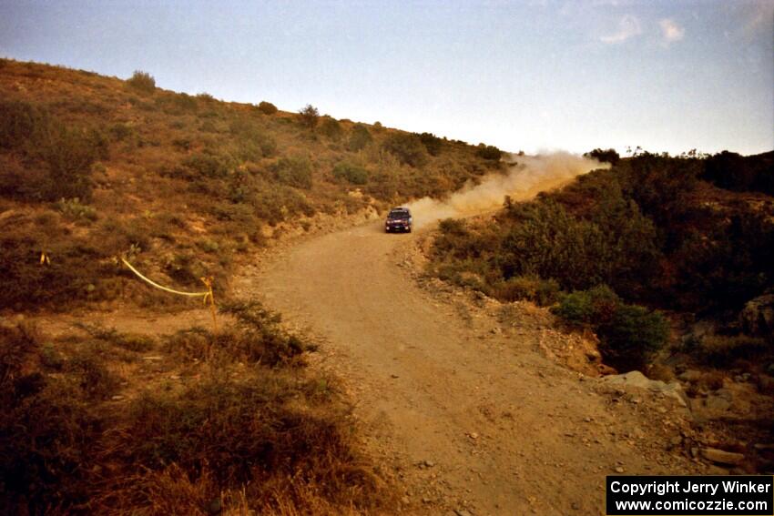 Mark Lovell / Mike Kidd Subaru WRX heads downhill on SS1, Mayer South.