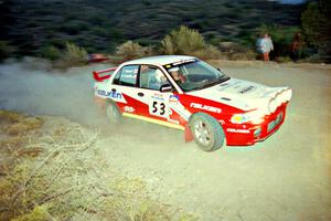 Tony Takaori / Ken Cassidy Mitsubishi Lancer Evo III on SS1