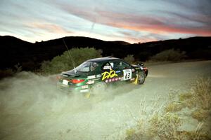 Tad Ohtake / Bob Martin Ford Escort ZX2 on SS1, Mayer South.