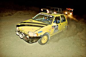 Andrew Grady / Bill Culbertson Toyota Corolla FX-16 gets back on the road in front of sweep on SS1, Mayer South.