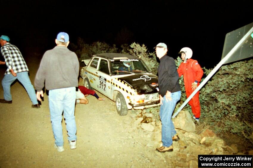 Dave Coleman / Paul Timmerman Datsun 510 gets pulled off of a sign on SS1, Mayer South.