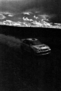 Mark Nelson / Alex Gelsomino Mitsubishi Lancer Evo VI at speed on Witty Tom North, SS7.