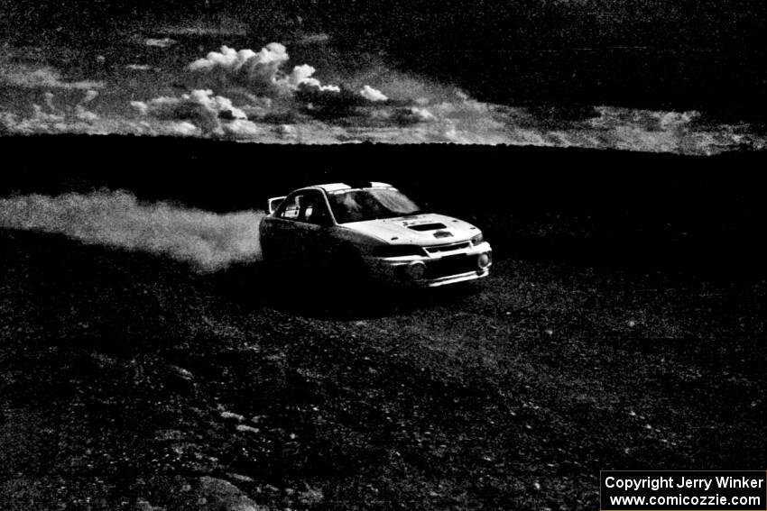 Tim Paterson / Scott Ferguson Mitsubishi Lancer Evo IV at speed on Witty Tom North, SS7.