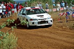 Tim Paterson / Scott Ferguson Mitsubishi Lancer Evo IV at the spectator location on Limestone North, SS8.