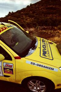 The organizer's car pulls into the finish of First View North (SS11) covered in hail.