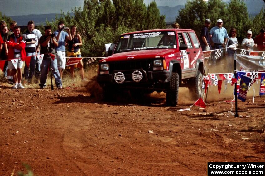 Dave Turner / Mike McComas Jeep Cherokee at the spectator location on Limestone North, SS8.