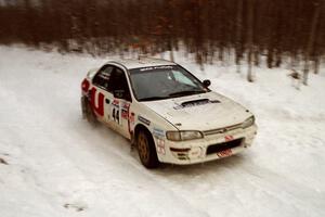 Henry Krolikowski / Cindy Krolikowski Subaru WRX STi at speed on SS4, Avery Lake.