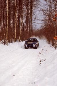 Eric Eaton / Kenny Almquist Subaru Impreza at speed on SS1, Hardwood Hills Rd.