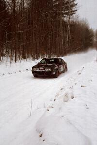 Mike Hurst / Rob Bohn Pontiac Sunbird Turbo at speed on SS1, Hardwood Hills Rd.