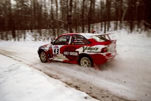 Kurosh Jahromi / Tony Lumino Ford Escort Cosworth RS at speed on SS1, Hardwood Hills Rd.