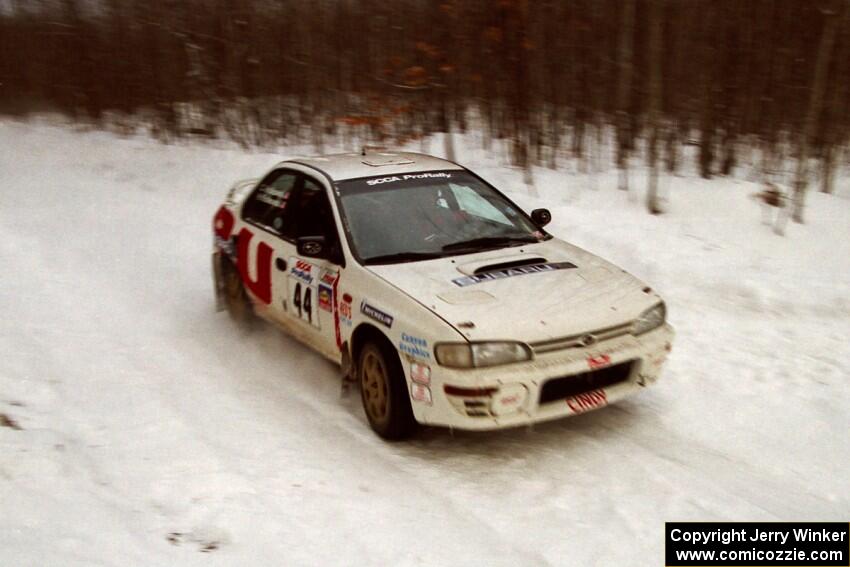 Henry Krolikowski / Cindy Krolikowski Subaru WRX STi at speed on SS4, Avery Lake.