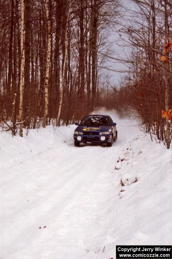 Eric Eaton / Kenny Almquist Subaru Impreza at speed on SS1, Hardwood Hills Rd.