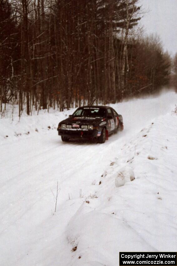 Mike Hurst / Rob Bohn Pontiac Sunbird Turbo at speed on SS1, Hardwood Hills Rd.