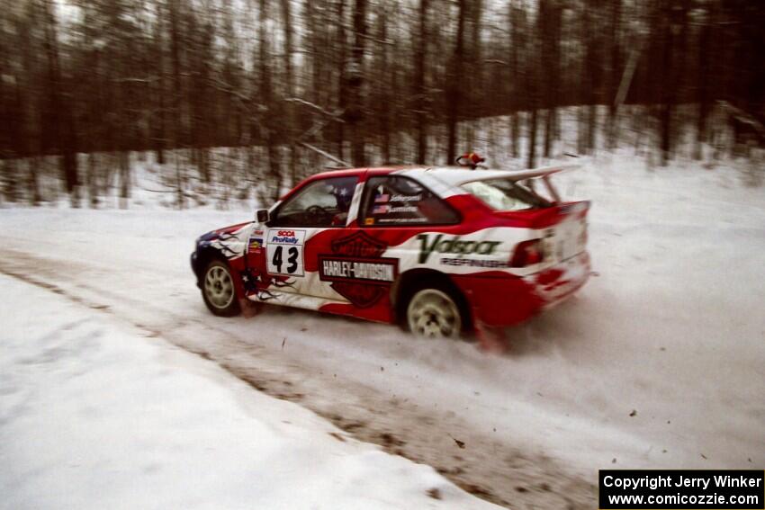 Kurosh Jahromi / Tony Lumino Ford Escort Cosworth RS at speed on SS1, Hardwood Hills Rd.