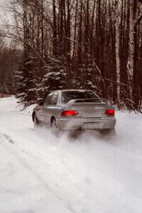 Russ Hodges / Jimmy Brandt Subaru WRX at speed on SS1, Hardwood Hills Rd.