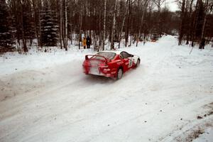 Brian Vinson / Richard Beels Toyota Supra Turbo goes off at a sharp icy turn on SS1, Hardwood Hills Rd.
