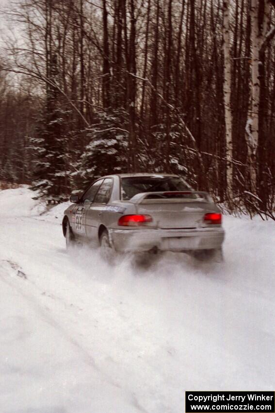 Russ Hodges / Jimmy Brandt Subaru WRX at speed on SS1, Hardwood Hills Rd.