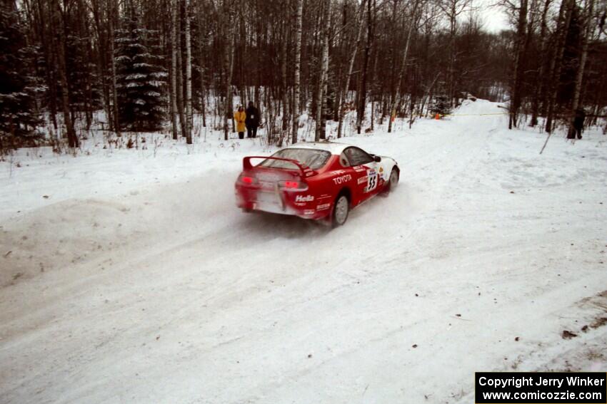 Brian Vinson / Richard Beels Toyota Supra Turbo goes off at a sharp icy turn on SS1, Hardwood Hills Rd.