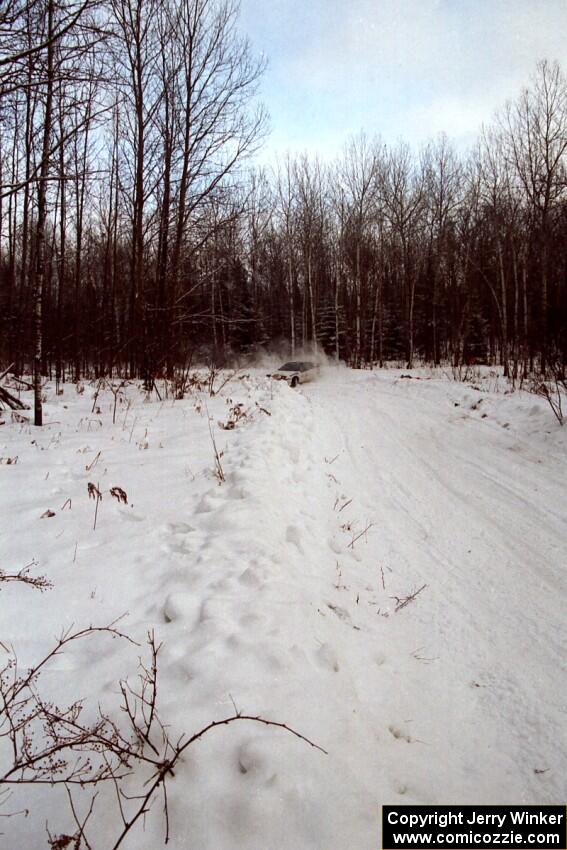 Carlos Lopez / John Atsma Eagle Talon spins at a sharp corner on SS1, Hardwood Hills Rd.