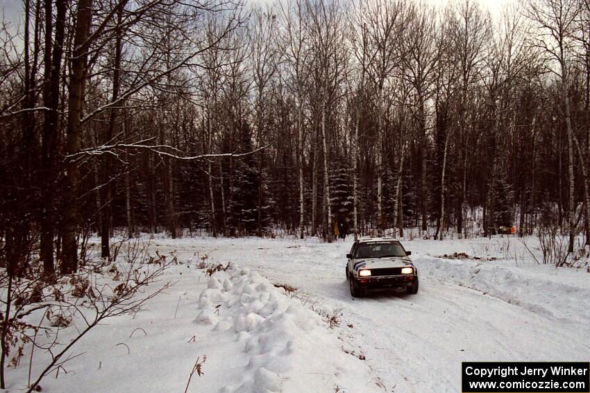 Eric Burmeister / Mark Buskirk VW GTI at a sharp corner on SS1, Hardwood Hills Rd.