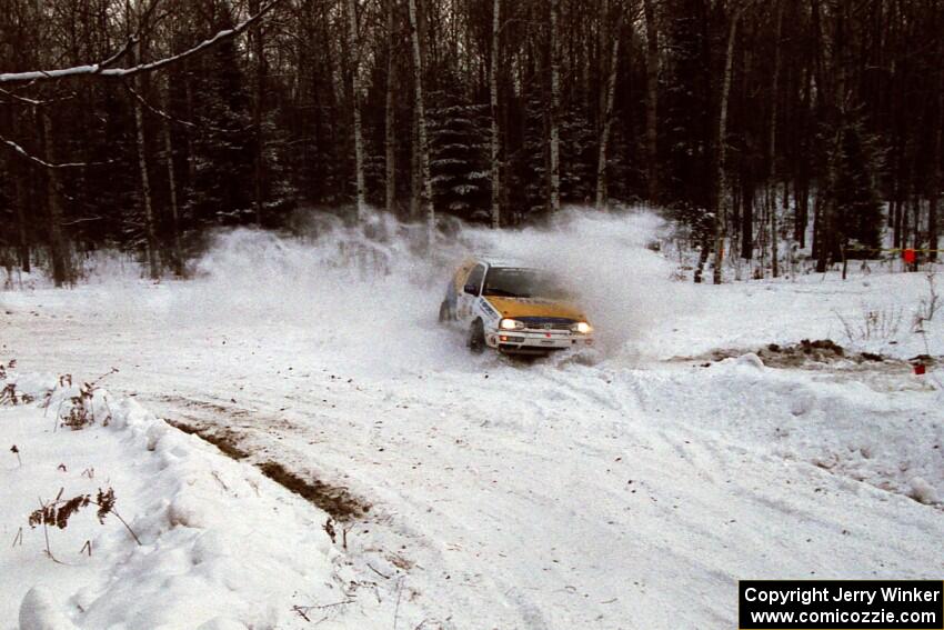 Brad Hawkins / Adrian Wintle VW GTI goes into a bank at a sharp corner on SS1, Hardwood Hills Rd.